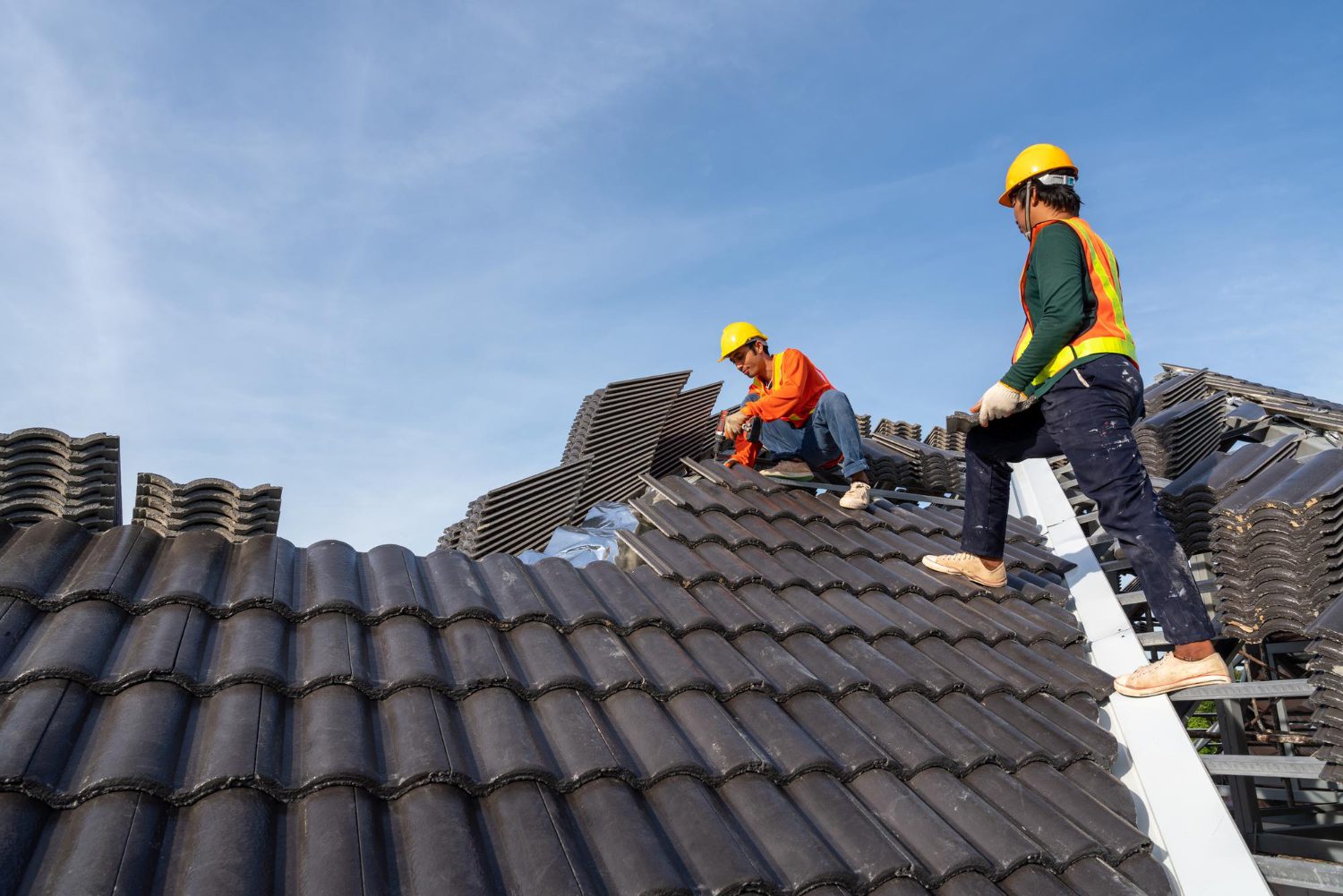 install new roof over old shingles Quebec